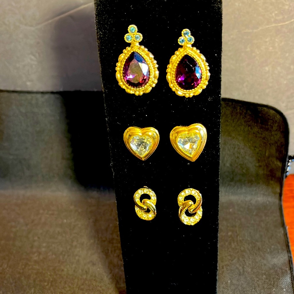 Set of 3 pairs of gold tone pierced earrings. Purple faceted bead,heart crystal